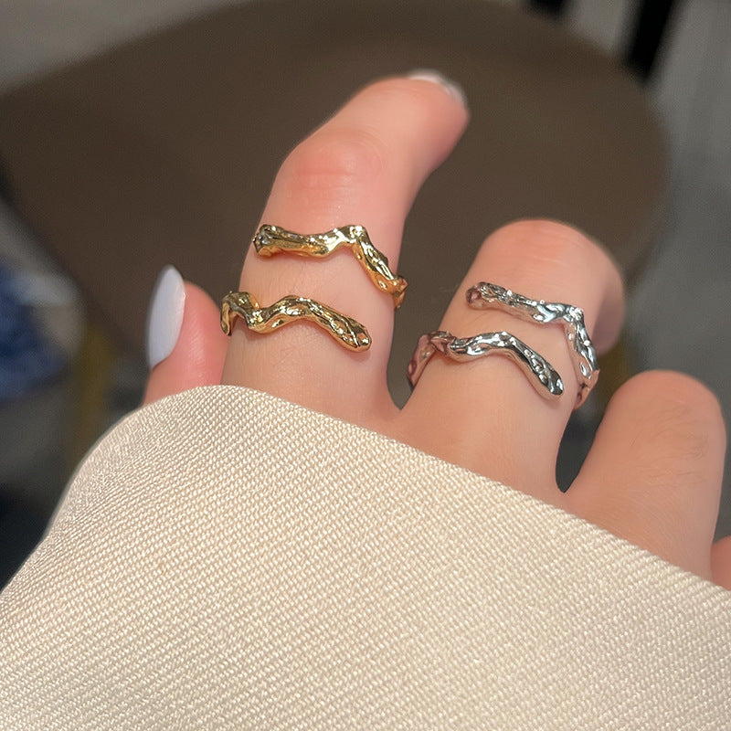 Korean version of the new cold wind irregular niche design metal wave shape girls open index finger ring accessories nugget earrings